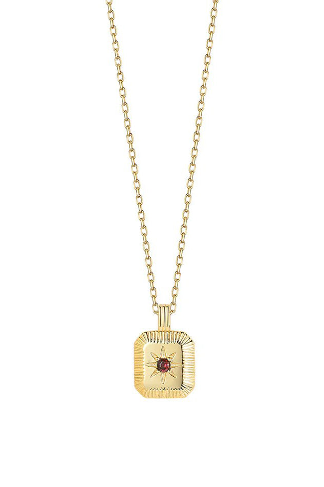 Gold necklace with a square pendant featuring a red gemstone on a white background
