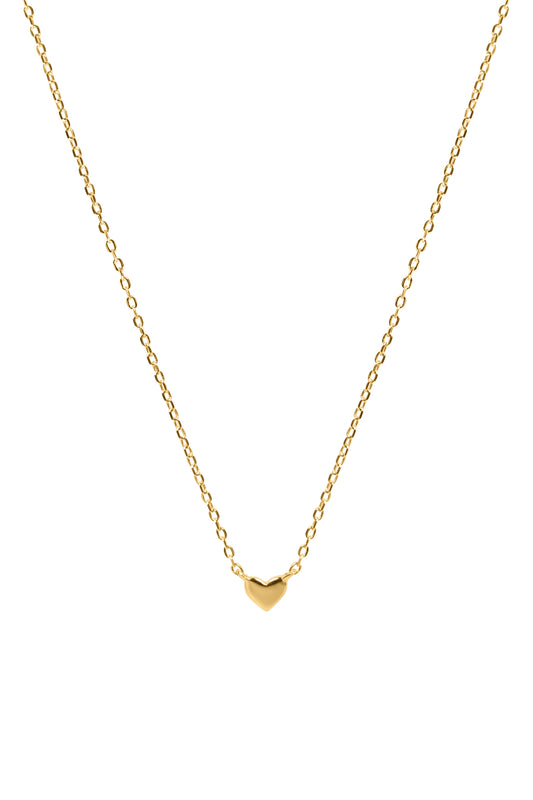 Gold necklace with a heart-shaped pendant on a white background