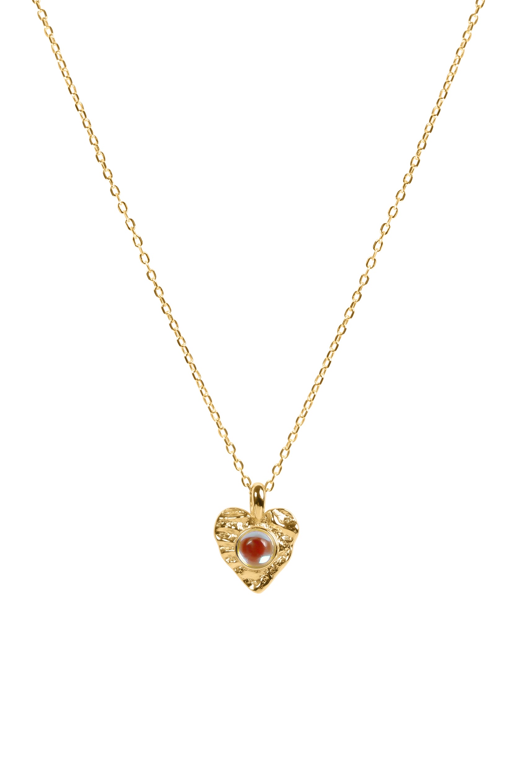 Gold necklace with a heart-shaped pendant featuring a moonstone on a white background