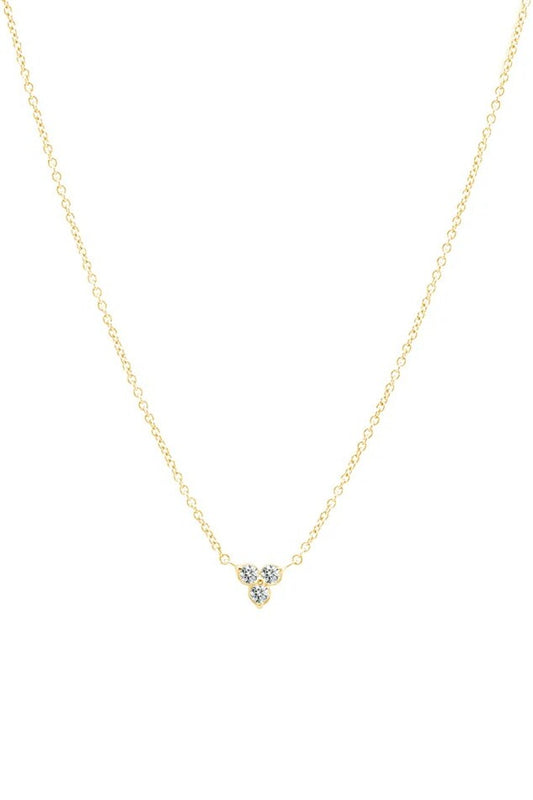 Gold necklace with a pendant featuring three gemstones on a white background